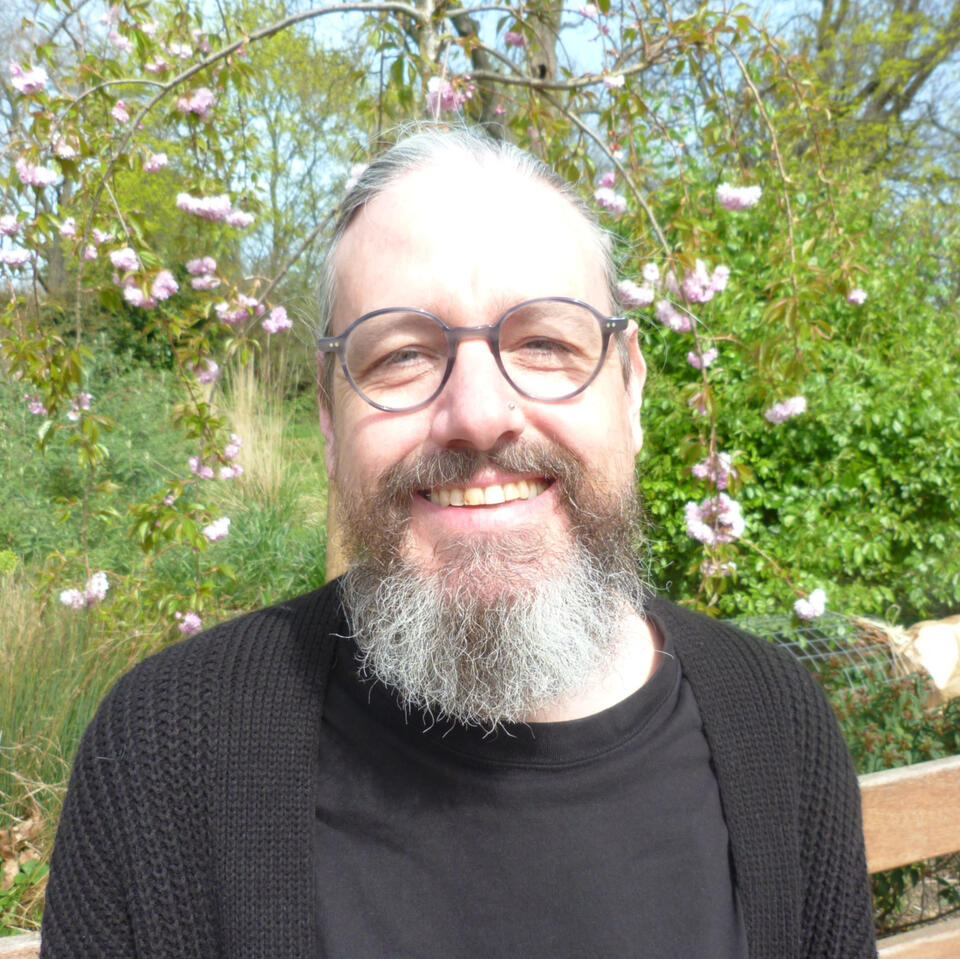 Steve smiling at camera in park